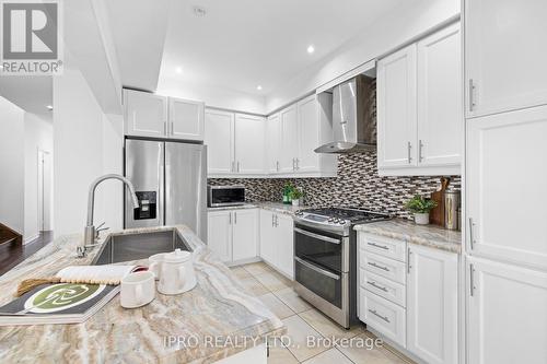 97 Gentile Circle, Vaughan, ON - Indoor Photo Showing Kitchen With Upgraded Kitchen