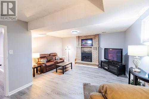 7 Fieldgate Drive, Brantford, ON - Indoor Photo Showing Living Room With Fireplace