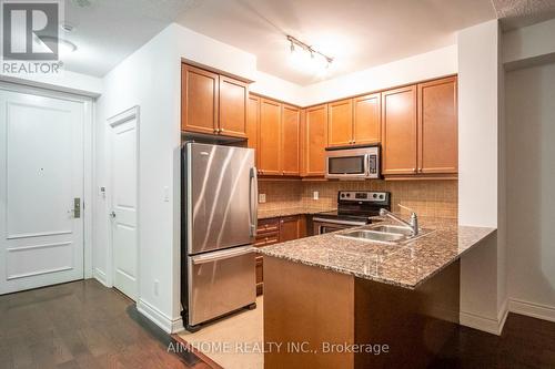 1110 - 10 Bloorview Place, Toronto, ON - Indoor Photo Showing Kitchen With Double Sink