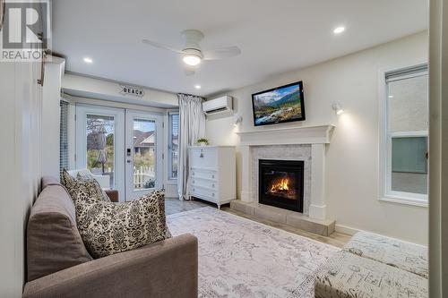 Suite Living Room / Bedroom - 3556 Athalmer Road, Kelowna, BC - Indoor Photo Showing Living Room With Fireplace