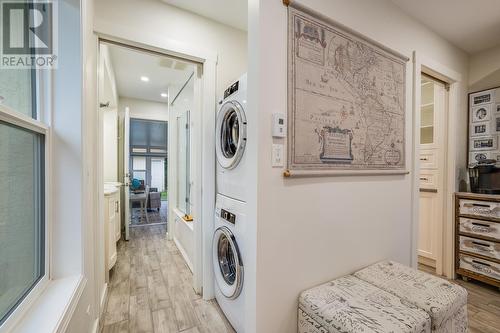 Heated Floors and separate laundry for suite - 3556 Athalmer Road, Kelowna, BC - Indoor Photo Showing Laundry Room