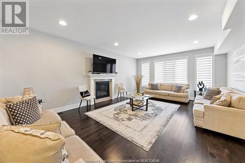 6268 Disputed, Lasalle, ON - Indoor Photo Showing Living Room With Fireplace