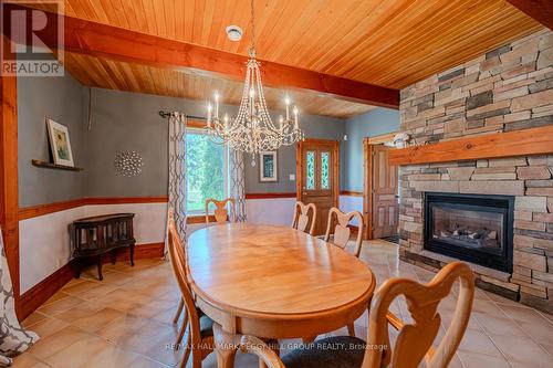 8464 6Th Line, Essa, ON - Indoor Photo Showing Dining Room With Fireplace