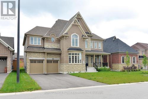 102 Rugman Crescent, Springwater, ON - Outdoor With Facade