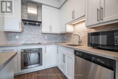 1702 - 2093 Fairview Street, Burlington, ON - Indoor Photo Showing Kitchen With Stainless Steel Kitchen With Upgraded Kitchen