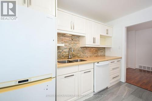 250 San Francisco Avenue, Hamilton, ON - Indoor Photo Showing Kitchen With Double Sink