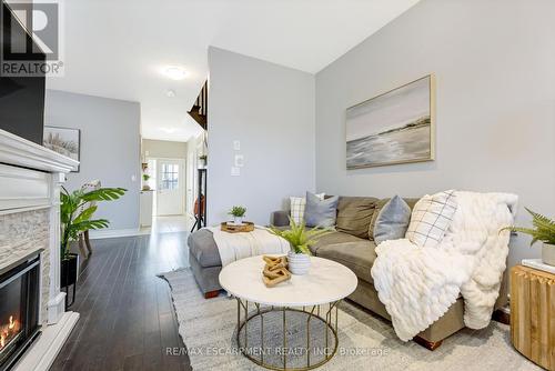 89 Courtney Street, Centre Wellington, ON - Indoor Photo Showing Living Room With Fireplace