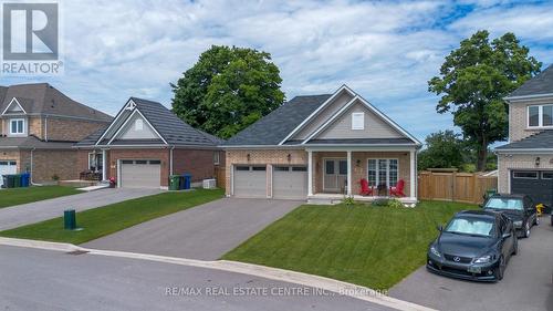 49 Todd Crescent, Southgate, ON - Outdoor With Facade