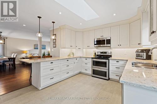 107 Westland Street, St. Catharines (462 - Rykert/Vansickle), ON - Indoor Photo Showing Kitchen With Double Sink With Upgraded Kitchen