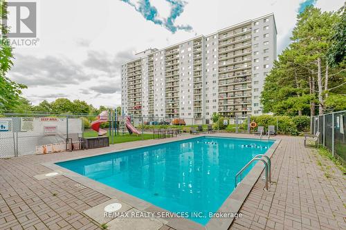 1206 - 1100 Caven Street, Mississauga, ON - Outdoor With In Ground Pool