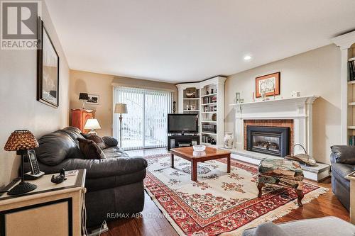 335 Carey Court, Oakville, ON - Indoor Photo Showing Living Room With Fireplace