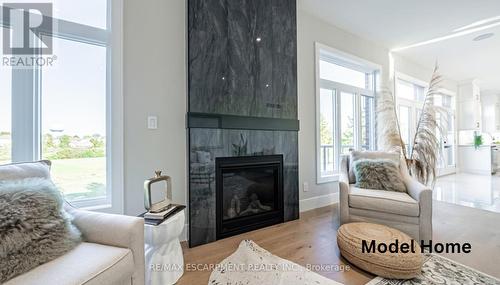 73 Workman Crescent, Blandford-Blenheim, ON - Indoor Photo Showing Living Room With Fireplace