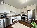 921 W 1St Avenue, Prince Rupert, BC  - Indoor Photo Showing Kitchen With Double Sink 