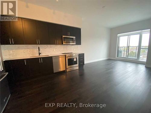 521 - 4055 Parkside Village Drive, Mississauga, ON - Indoor Photo Showing Kitchen