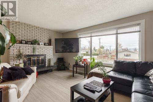 4493 Wasilow Road, Kelowna, BC - Indoor Photo Showing Living Room With Fireplace