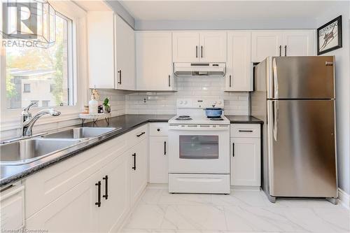 220 Salisbury Avenue Unit# 1, Cambridge, ON - Indoor Photo Showing Kitchen With Double Sink