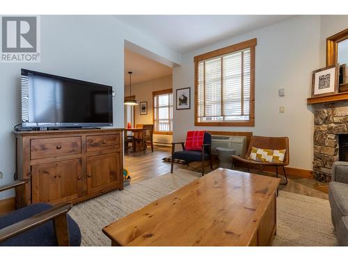 4559 Timberline Crescent Unit# 427, Fernie, BC - Indoor Photo Showing Living Room With Fireplace