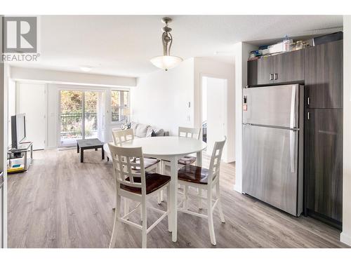 Bright open concept living with easy care flooring - 655 Academy Way Unit# 107, Kelowna, BC - Indoor