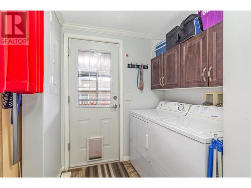 Laundry Room and access to deck and backyard - 610 Katherine Road Unit# 70, West Kelowna, BC 