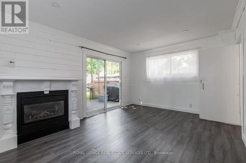 43 Elora Street, South Bruce, ON - Indoor Photo Showing Living Room With Fireplace