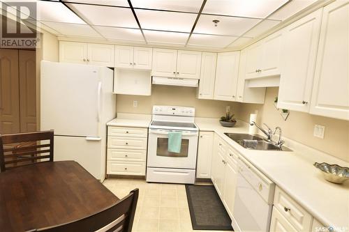 207 2550 25Th Avenue, Regina, SK - Indoor Photo Showing Kitchen With Double Sink