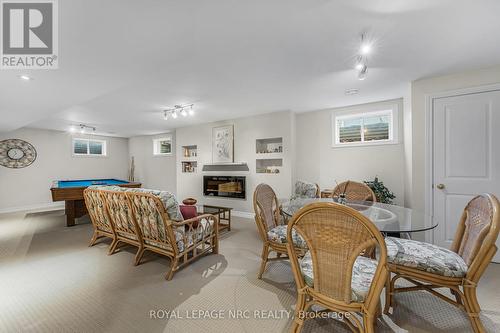 38 Colonel Butler Crescent, Niagara-On-The-Lake (101 - Town), ON - Indoor Photo Showing Dining Room With Fireplace