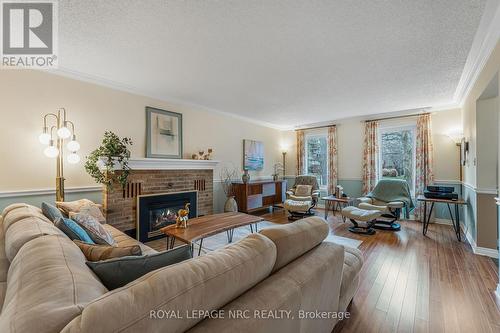 38 Colonel Butler Crescent, Niagara-On-The-Lake (101 - Town), ON - Indoor Photo Showing Living Room With Fireplace