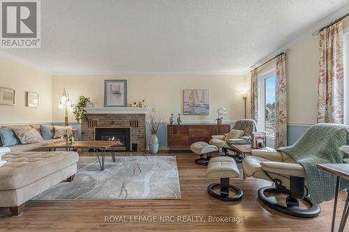 38 Colonel Butler Crescent, Niagara-On-The-Lake (101 - Town), ON - Indoor Photo Showing Living Room With Fireplace