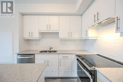 420 - 251 Northfield Drive E, Waterloo, ON - Indoor Photo Showing Kitchen With Double Sink