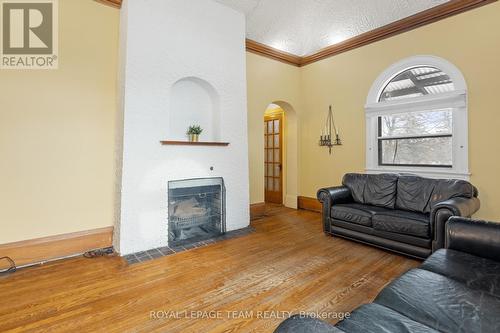 334 Queen Elizabeth Drive S, Ottawa, ON - Indoor Photo Showing Living Room With Fireplace