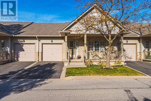 49 - 34 Southbrook Drive, Hamilton, ON - Outdoor With Facade