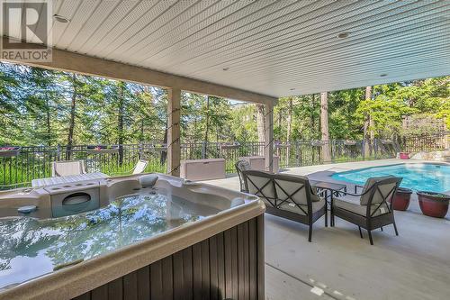 251 Highgate Court, Kelowna, BC - Outdoor With In Ground Pool With Deck Patio Veranda With Exterior