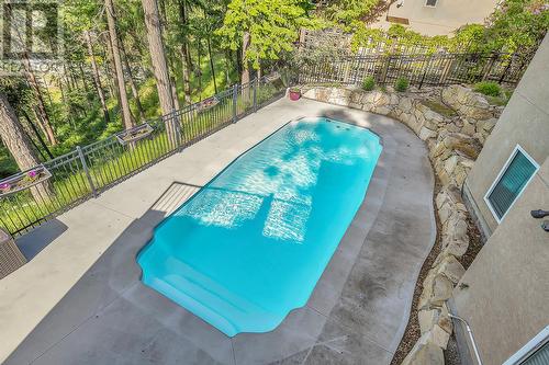 251 Highgate Court, Kelowna, BC - Outdoor With In Ground Pool