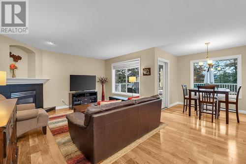 251 Highgate Court, Kelowna, BC - Indoor Photo Showing Living Room With Fireplace