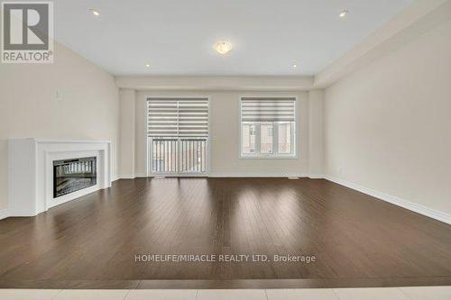 85 Grassbourne Avenue, Kitchener, ON - Indoor Photo Showing Living Room With Fireplace