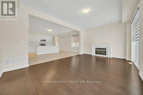 85 Grassbourne Avenue, Kitchener, ON - Indoor Photo Showing Living Room With Fireplace