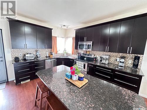 304 Abbott Bay, Estevan, SK - Indoor Photo Showing Kitchen With Upgraded Kitchen