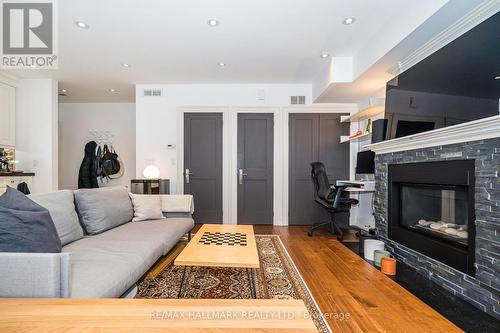 Coach H - 153 Rusholme Road, Toronto, ON - Indoor Photo Showing Living Room With Fireplace