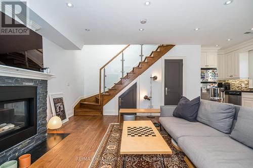 Coach H - 153 Rusholme Road, Toronto, ON - Indoor Photo Showing Living Room With Fireplace