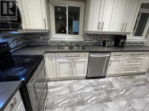 14 Talbot Street, Brampton, ON - Indoor Photo Showing Kitchen With Double Sink