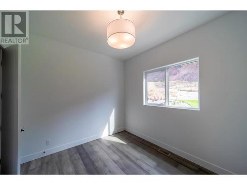 Main Floor Bedroom 2 - 9723 Centrestone Drive, Lake Country, BC - Indoor Photo Showing Other Room