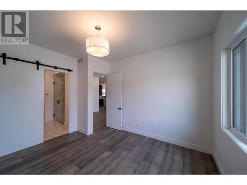 Primary Bedroom - 9723 Centrestone Drive, Lake Country, BC - Indoor Photo Showing Other Room