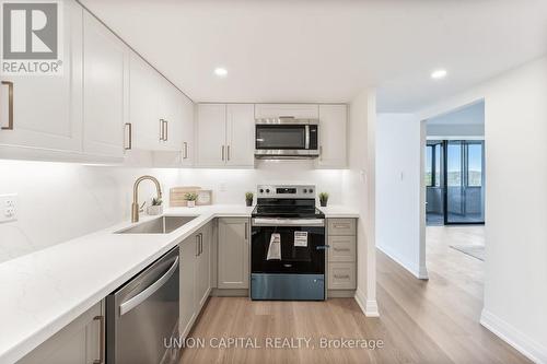 611 - 2350 Bridletowne Circle, Toronto, ON - Indoor Photo Showing Kitchen With Upgraded Kitchen