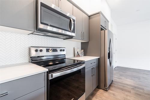 116-8960 Dallas Drive, Kamloops, BC - Indoor Photo Showing Kitchen With Stainless Steel Kitchen