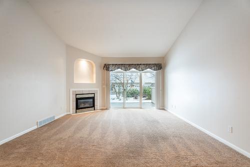 18-650 Harrington Road, Kamloops, BC - Indoor Photo Showing Other Room With Fireplace