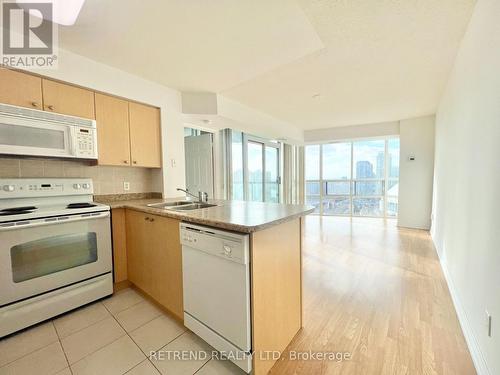 3001 - 30 Grand Trunk Crescent, Toronto, ON - Indoor Photo Showing Kitchen With Double Sink