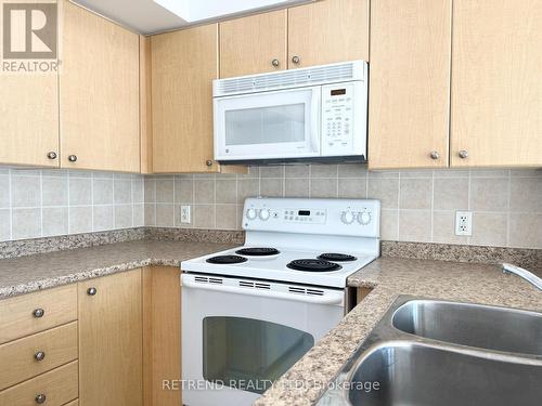 3001 - 30 Grand Trunk Crescent, Toronto, ON - Indoor Photo Showing Kitchen With Double Sink