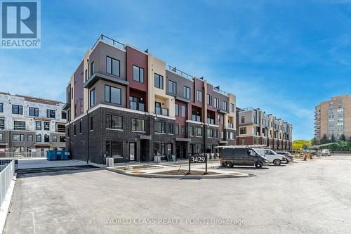 03 - 3429 Ridgeway Drive, Mississauga, ON - Outdoor With Facade