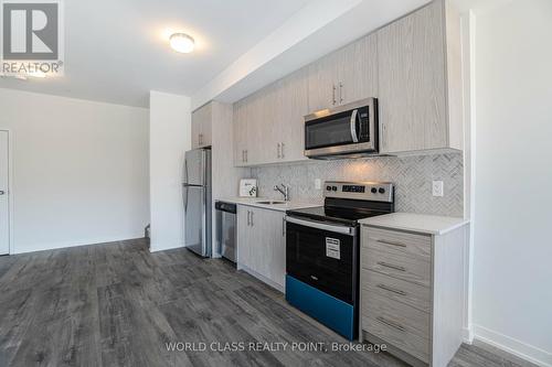 03 - 3429 Ridgeway Drive, Mississauga, ON - Indoor Photo Showing Kitchen With Stainless Steel Kitchen