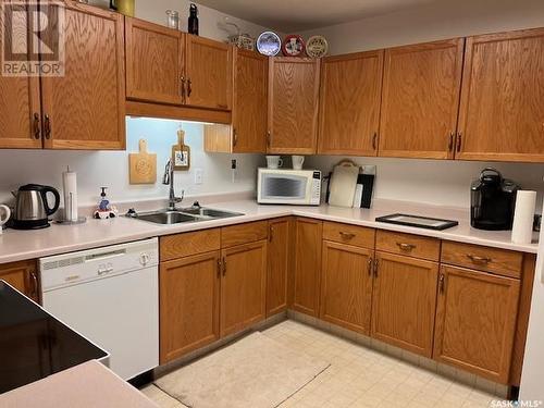 101 102 1St Avenue, Caronport, SK - Indoor Photo Showing Kitchen With Double Sink